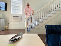 The downstairs floor had a little fridge, a microwave, a coffee maker. and a little siiting area with a couch and large flatscreen tv.