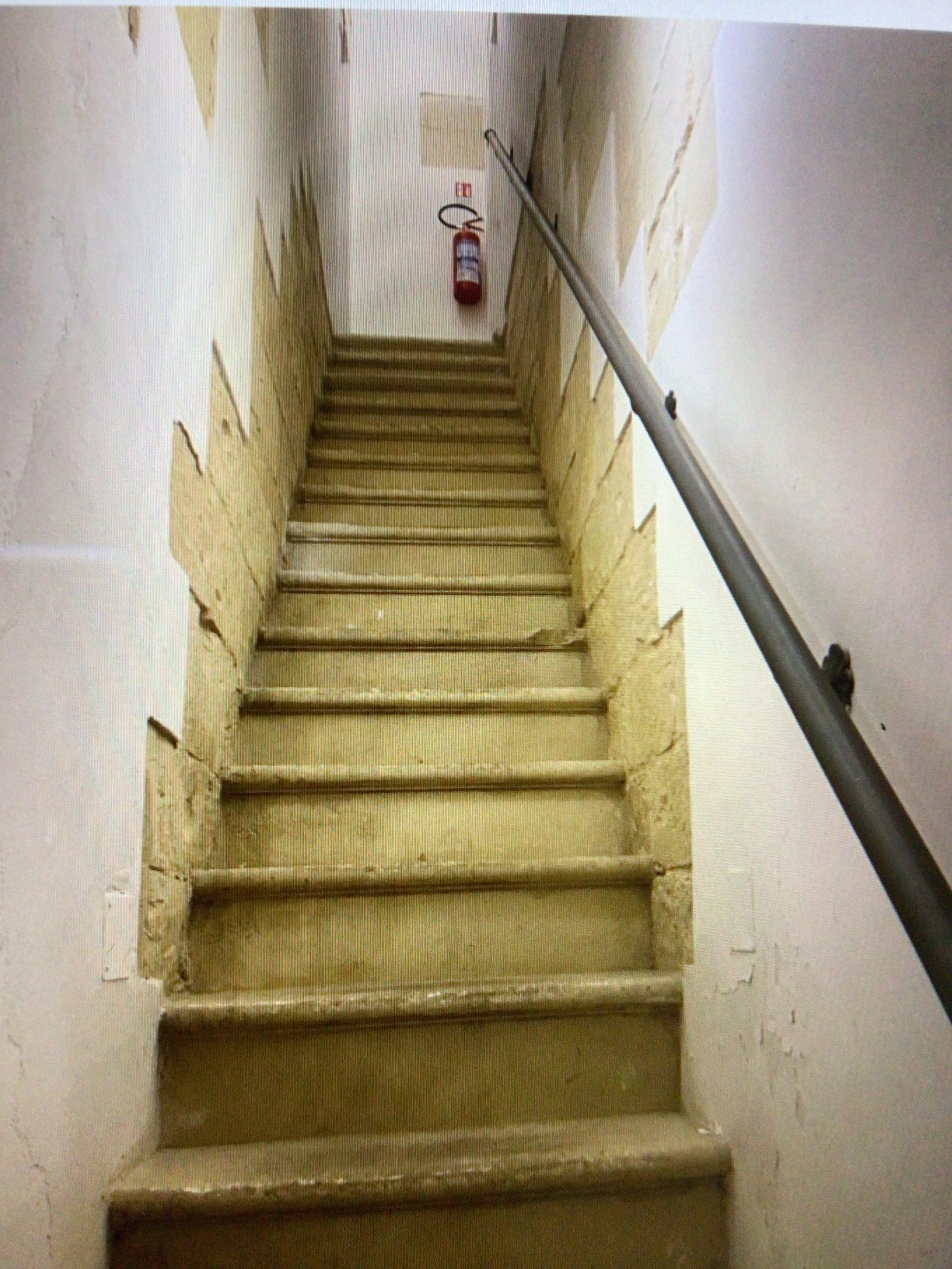 Stairs into apartment. 