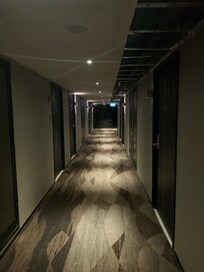 outside of the room, corridor.