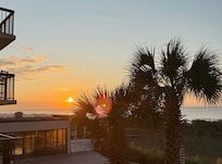 I raised camera high over rail to get sunset. (East is on our left) pretty just the same.