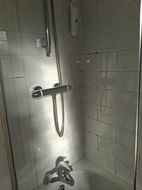 Mould on grouting. Need scrubbing with mould remover