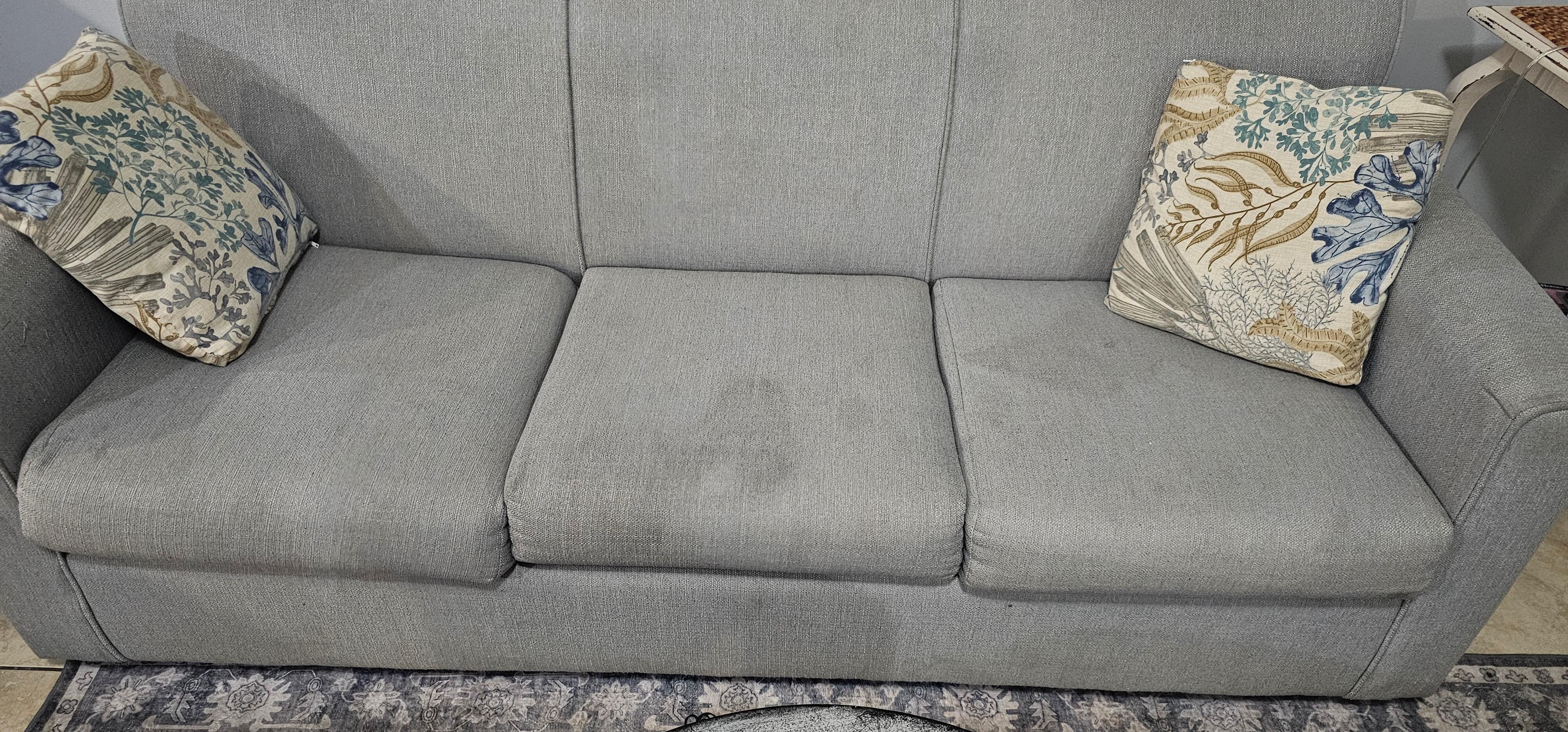 Filty couch unlike advertisement.