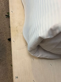 Exposed staples on childs bed