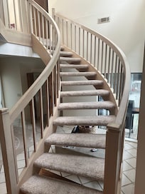 The stairway to 2 bedrooms