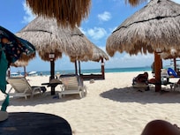 Resort beach area sipping drinks and eating fresh guacamole!