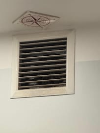 Vent blowing out dust