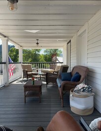 The upstairs covered balcony.