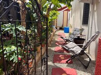 Seating with Banana trees and lovely planting