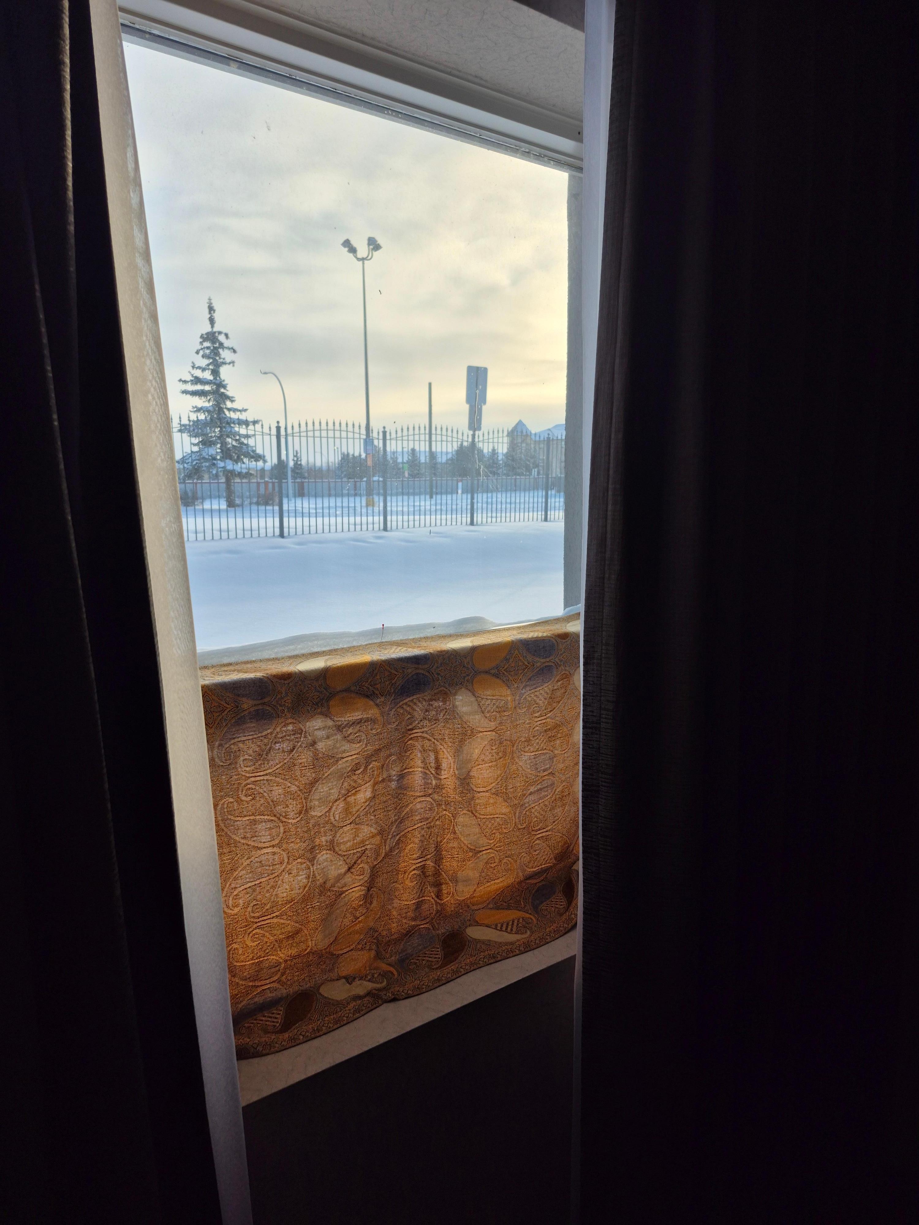 I pinned my scarf to window to keep draft out. 