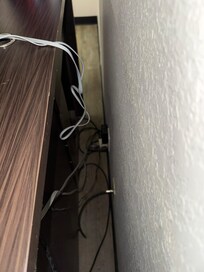 Lots of plugs in one socket looks dangerous. Looked to see if tv was plugged in and found out it was connected to wall switch.
