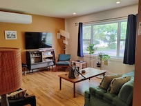 Living room- great space for relaxing and conversation with fun mid-mod flair.