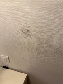 Dirty wall - black stains everywhere.