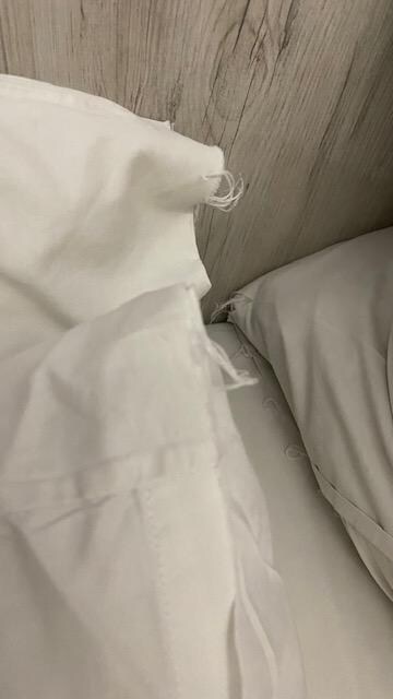 Threadbare and grey bedlinen