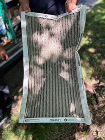 The filter from the air conditioner. It was so full of debris it was collapsing in on itself.