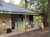 Warm and cozy indoors, the rain on the tin roof and the sound of the wind in the trees made for a perfect winter stay.