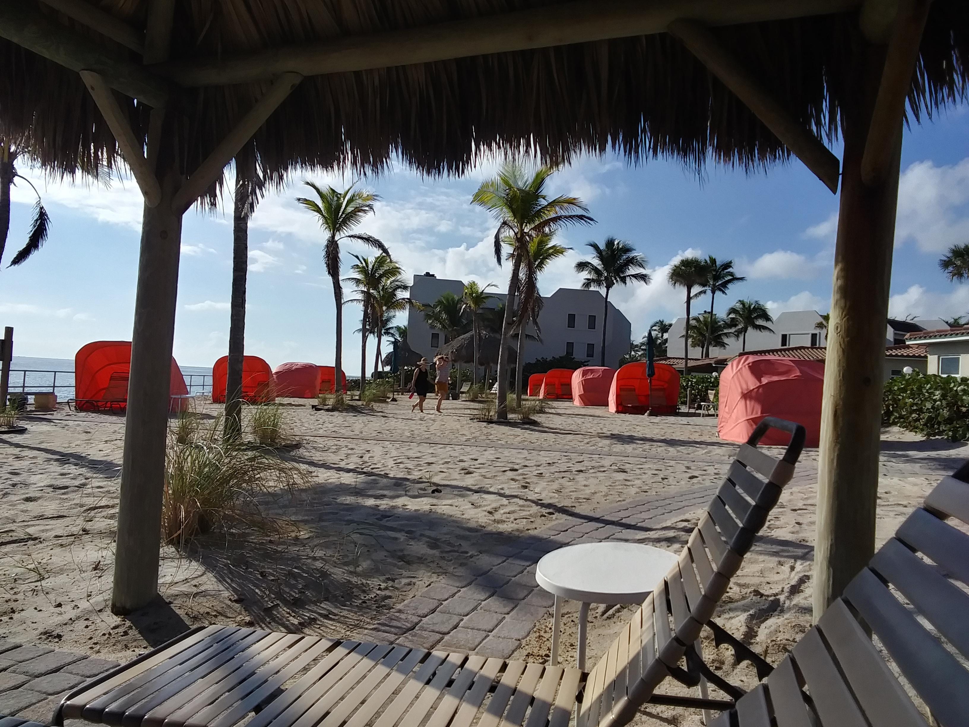 The private beach area is clean and inviting.