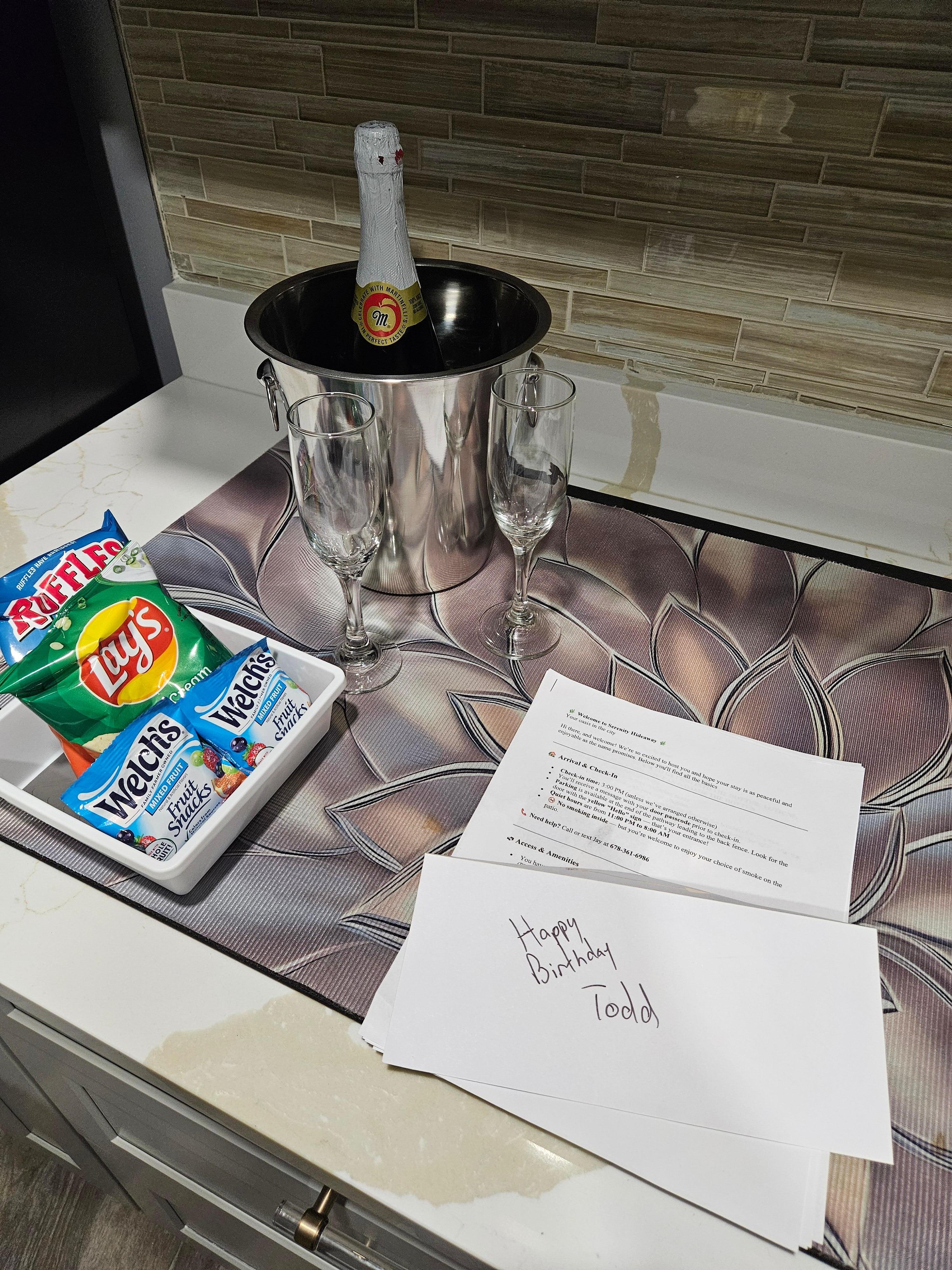 Surprise birthday letter, cider, and snacks!