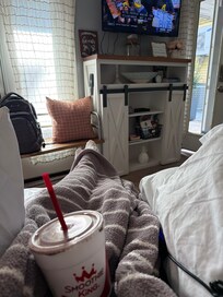 Watching College Football and enjoying a Smoothie King that was just a couple of blocks down the street!