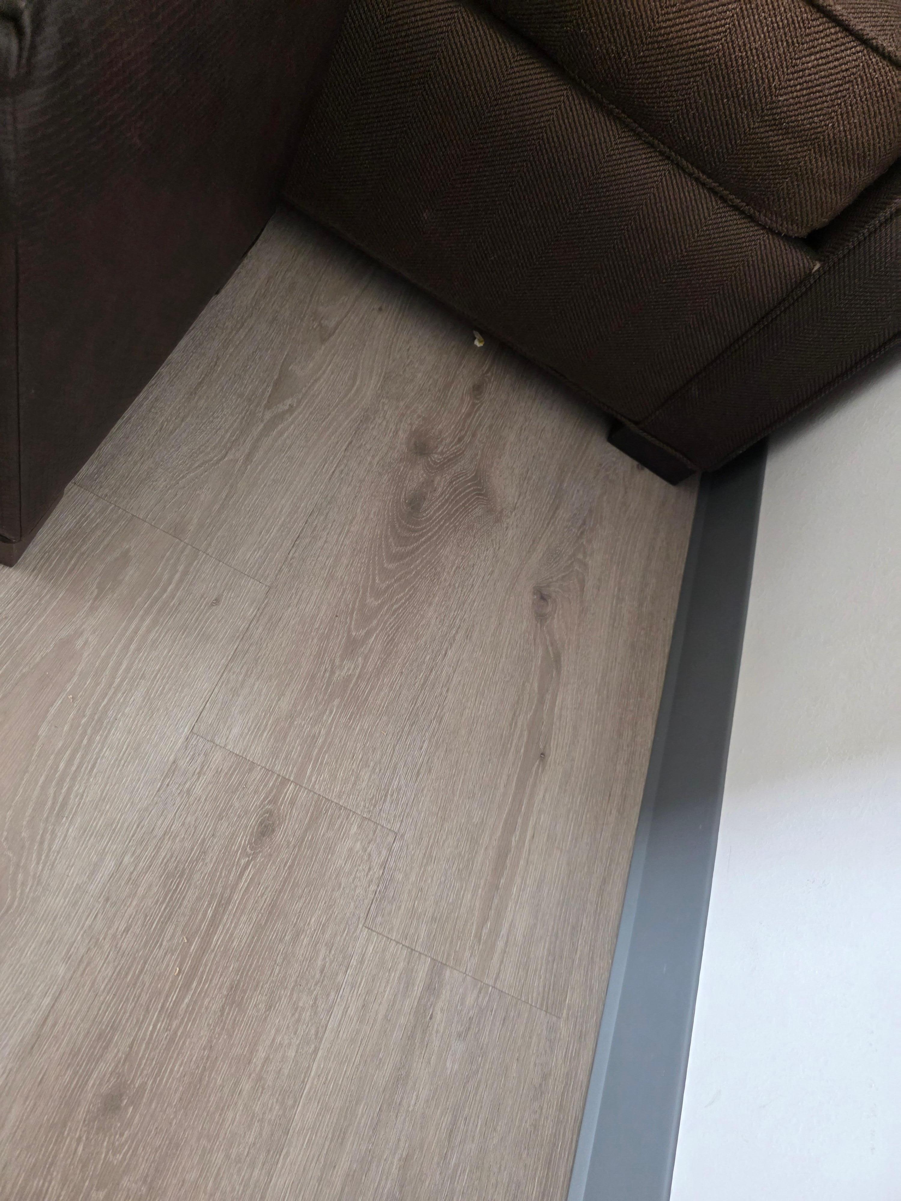 Dirty floor that was never swept or mopped.