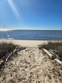 Walkway to beach in backyard.