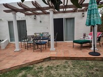 Lovely backyard retreat. Perfect for reading, relaxing, and enjoying your favorite beverage.