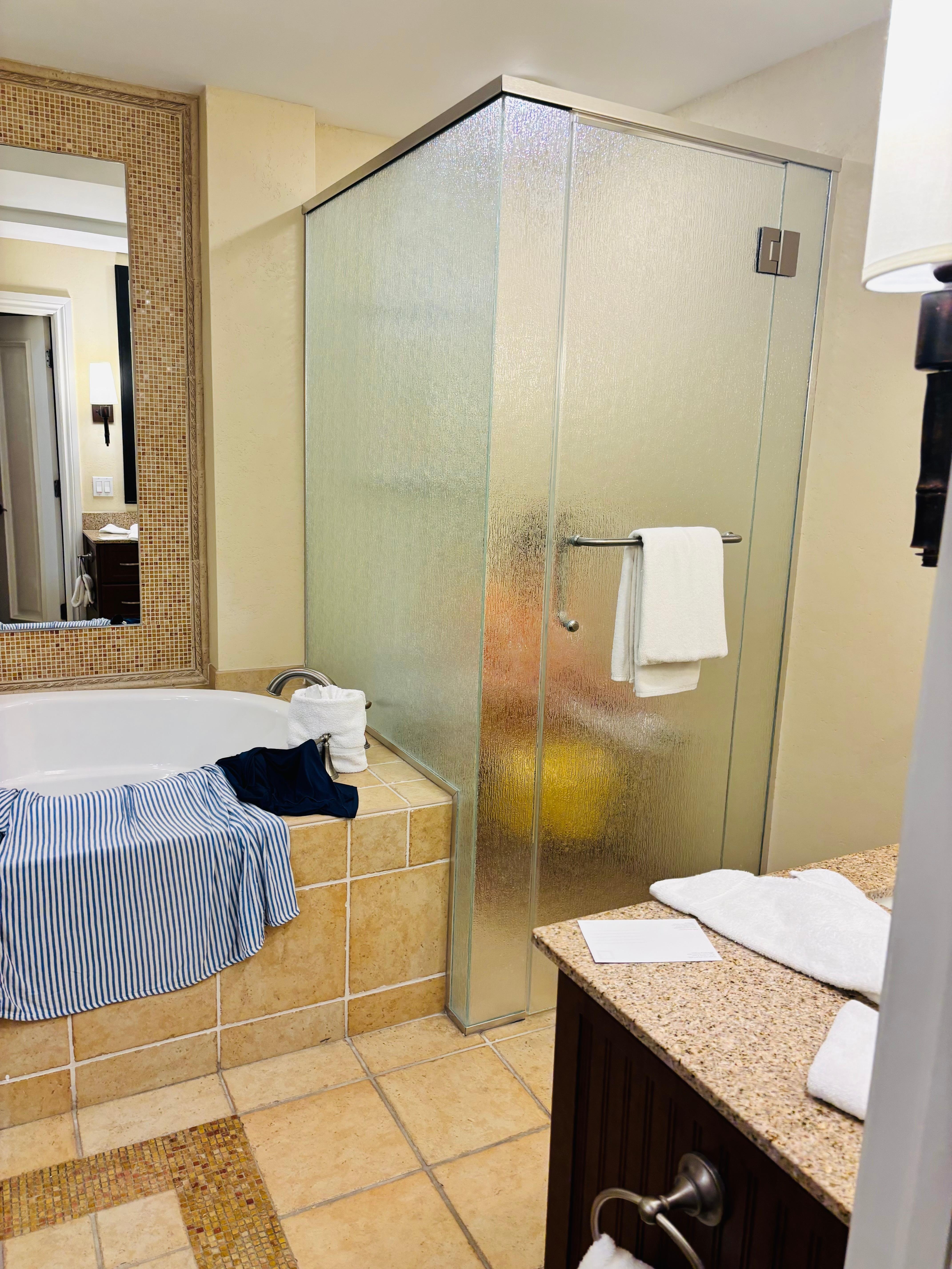 “Landlord special” remodel. This is a toilet inside of a shower stall.
