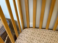 Crib next to outlet