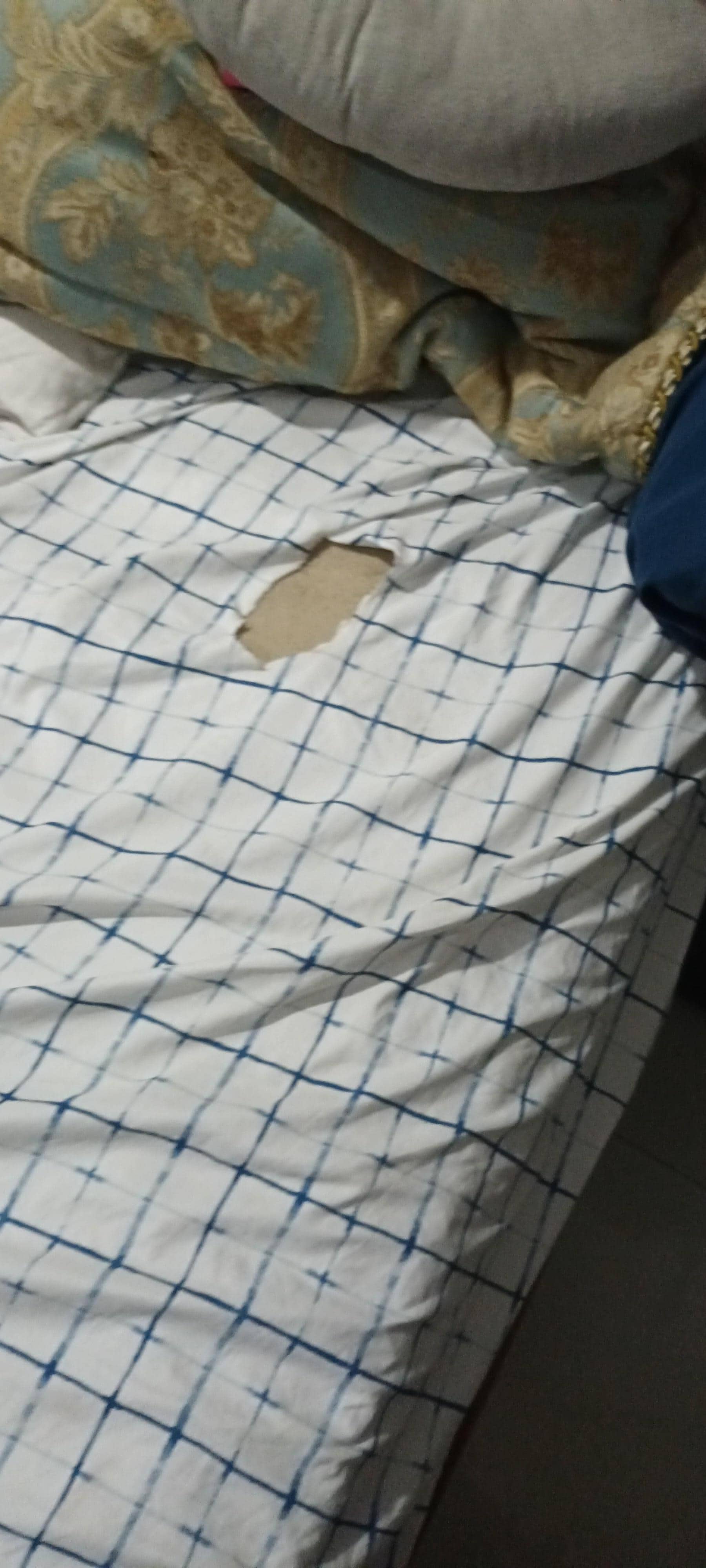 Bed sheets with holes in them.