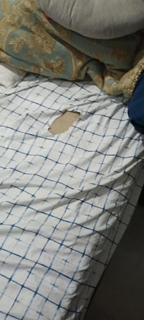 Bed sheets with holes in them.