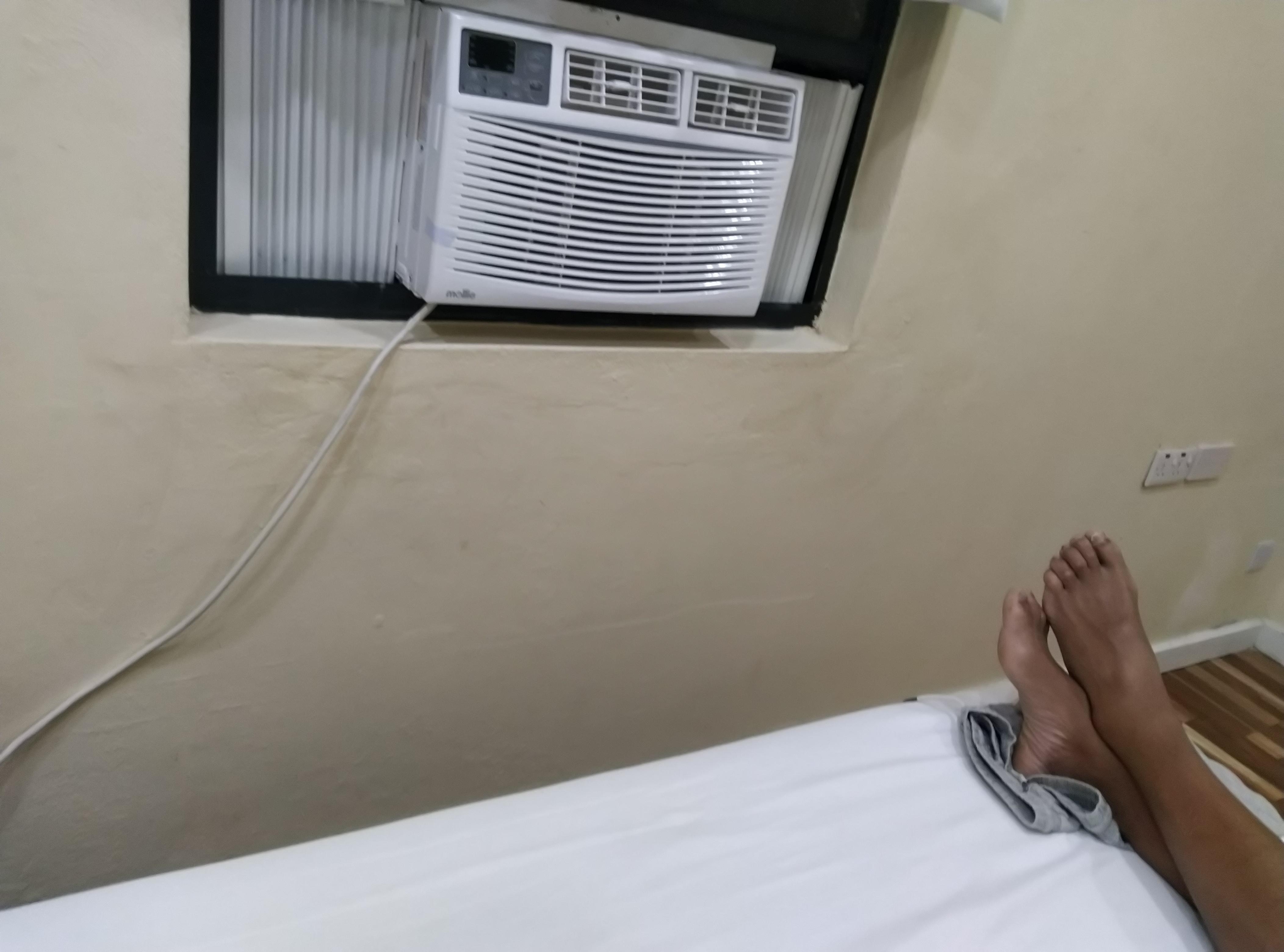 Only window in the bedroom no partial sea view but a brick wall 