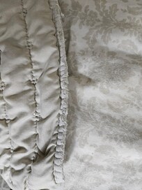 Edge of blanket, some of the towels/wash cloths were the same.