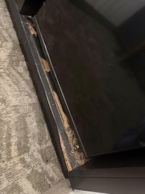 The mini fridge was falling in