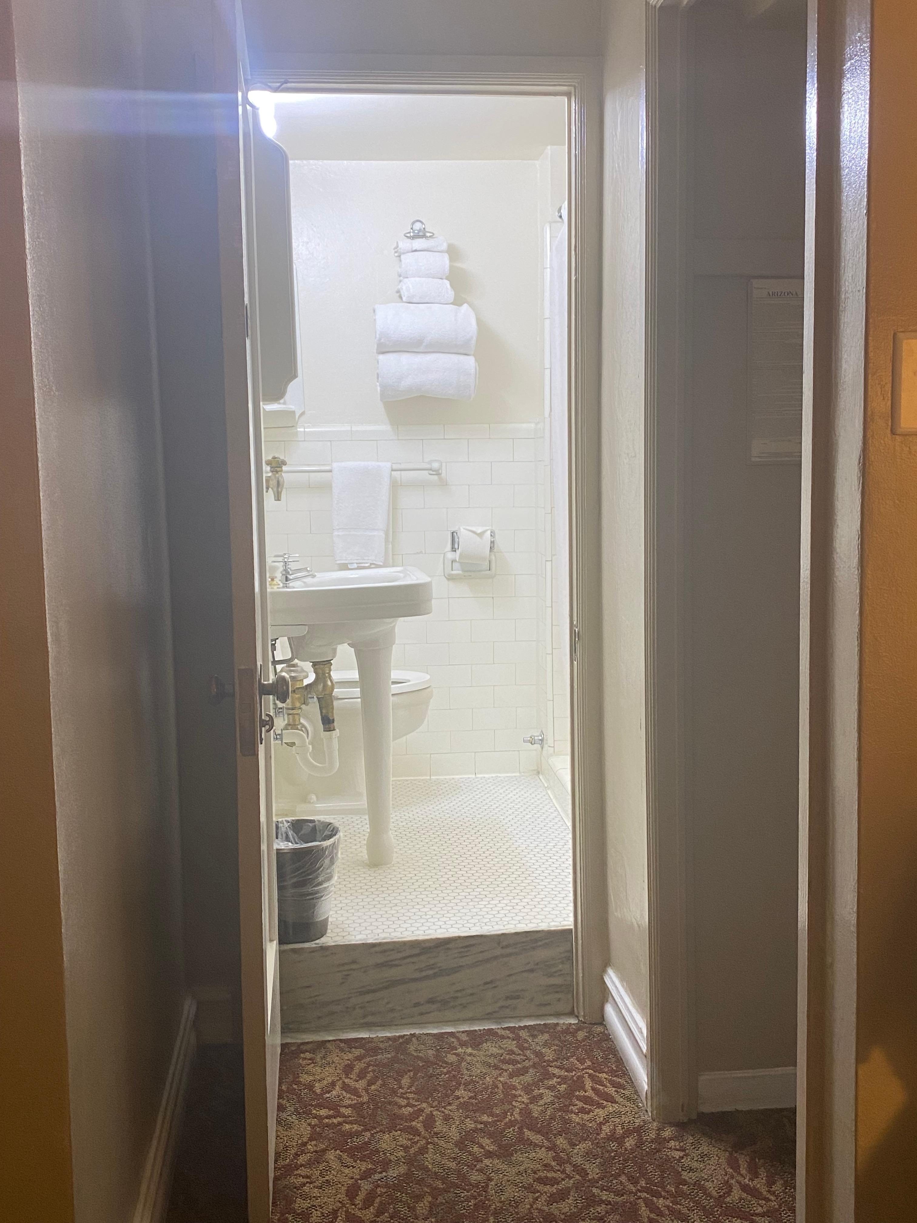 Bathroom has a 10” step up. Oldest plumbing I’ve ever seen and I’m 76 years old. 