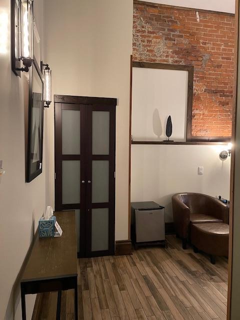 Just inside door of room