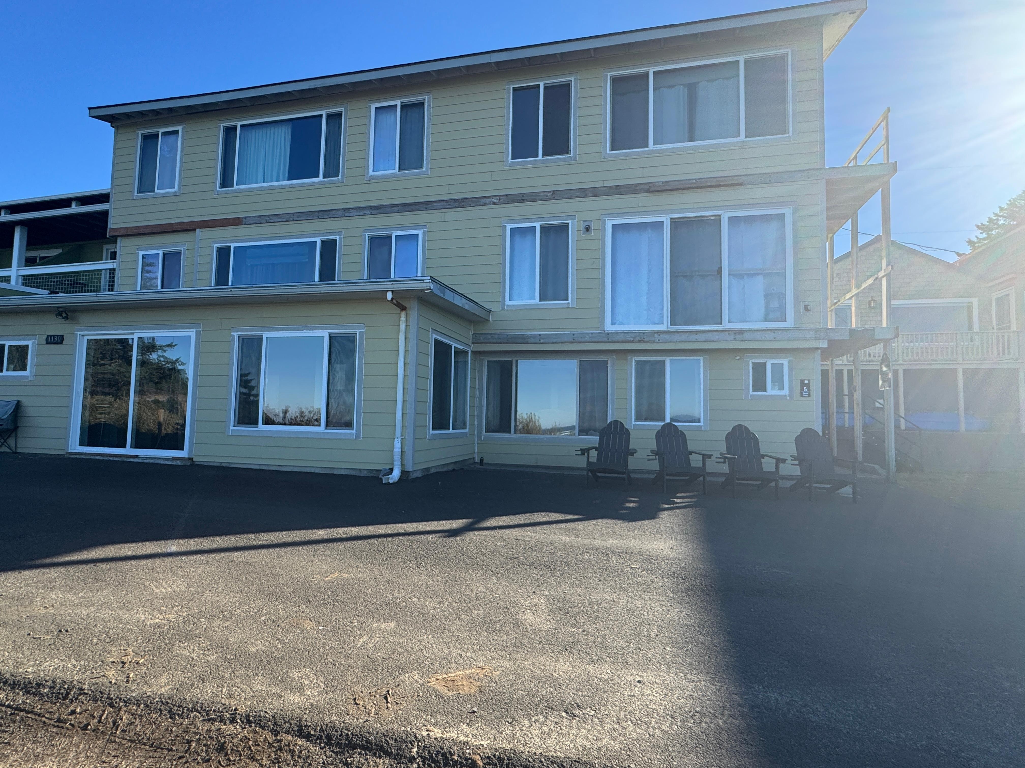 (bottom area with the sliding glass door.) enjoyable stay, clean and roomy, lots of windows, trails to the beach area 