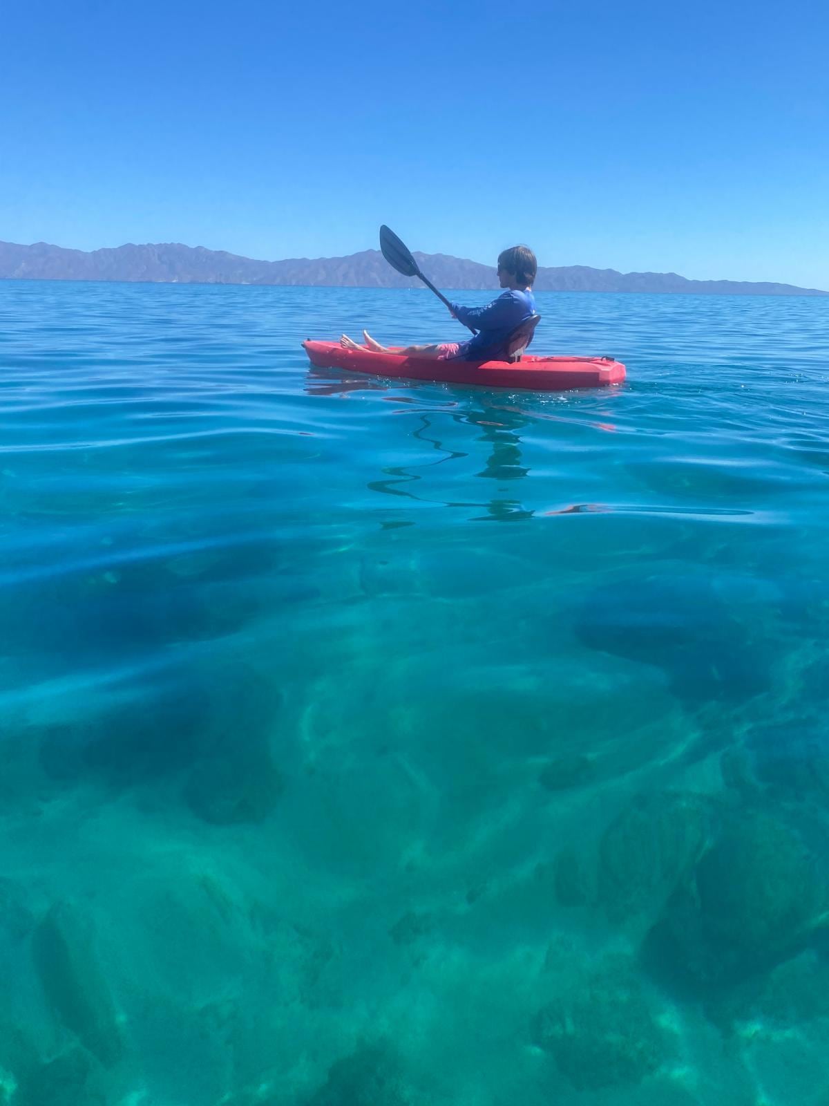 The leaky kayak and crystal clear water