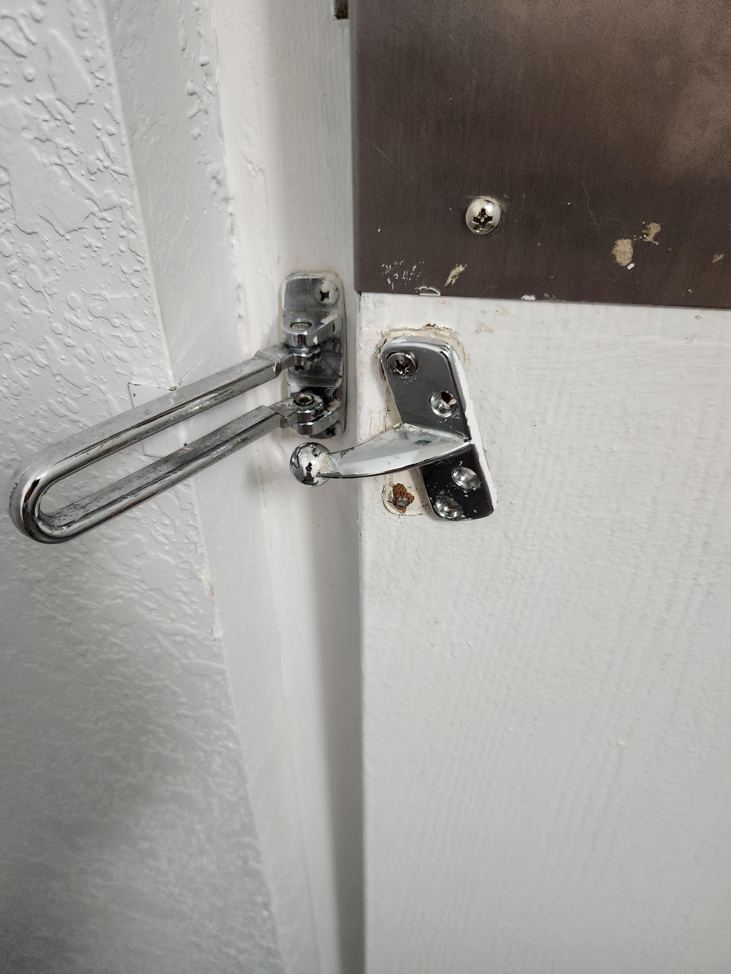 Broken door locking device.