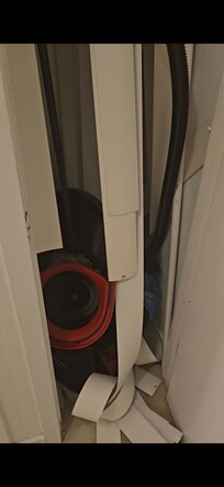 Closet filled with ... this... doesn't feel very professional or like a hotel at all