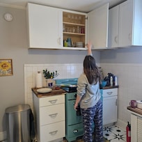The cabinets in the kitchen are giant-height! We thought this was funny, but also we couldn't use the wine glasses.