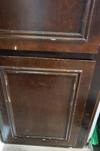 Cabinets are beat up and chipped