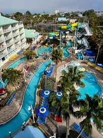 View of the pool and waterpark from the guest bedroom balcony