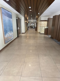 I couldn’t find any other pictures of our actual room but I do have video footage. So this is the best I could get. It’s picture of the lobby from the back entrance to the elevator. It’s so beautiful and clean!