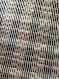 Red stain in carpeting