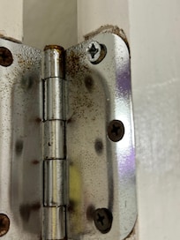 Bathroom door coming off hinges