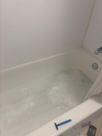 Water in tub would fill to the ankle when showering