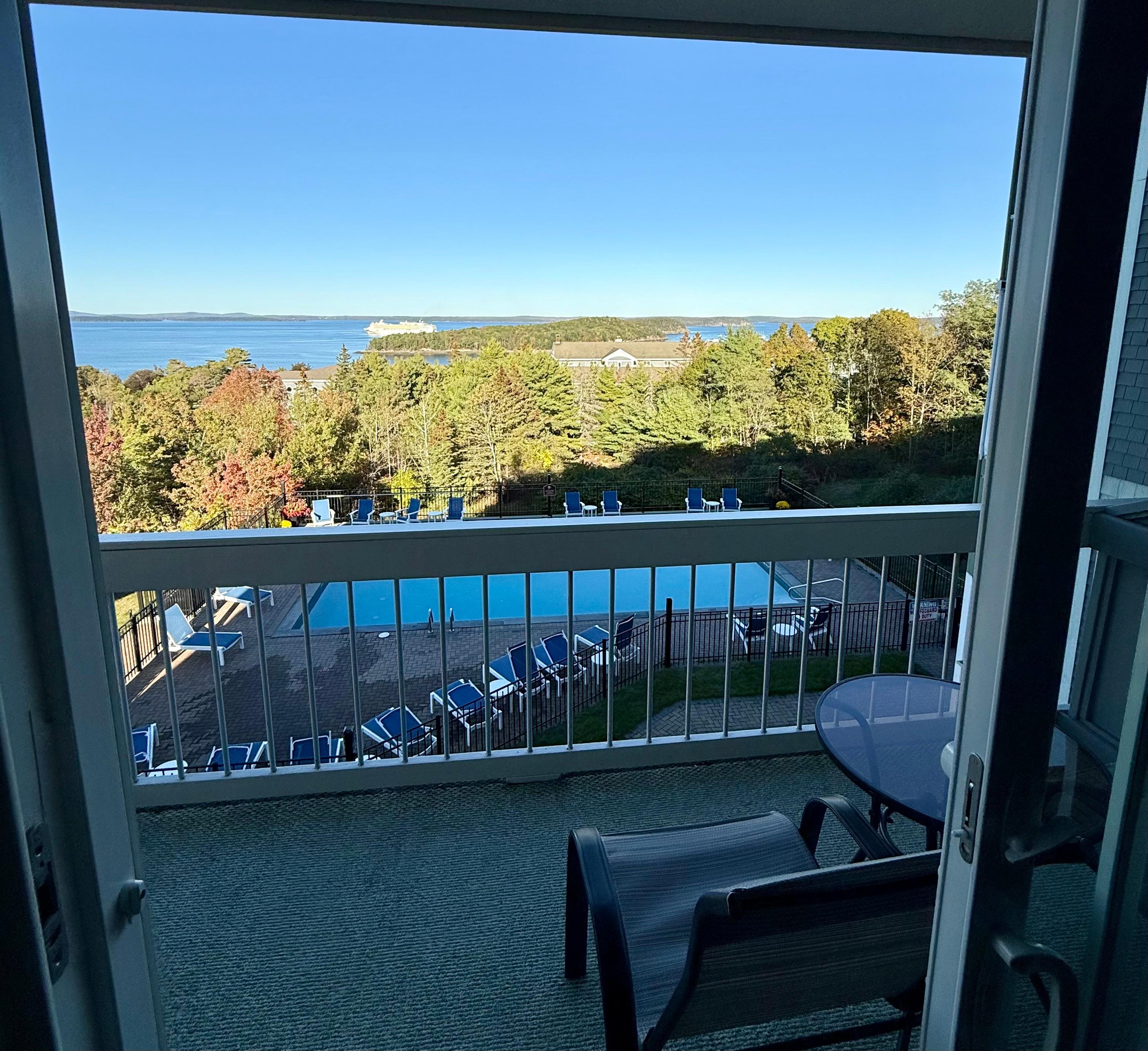 Ships & boats cruise past.