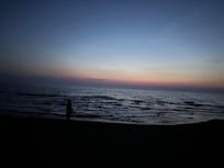 The beach at sunset.