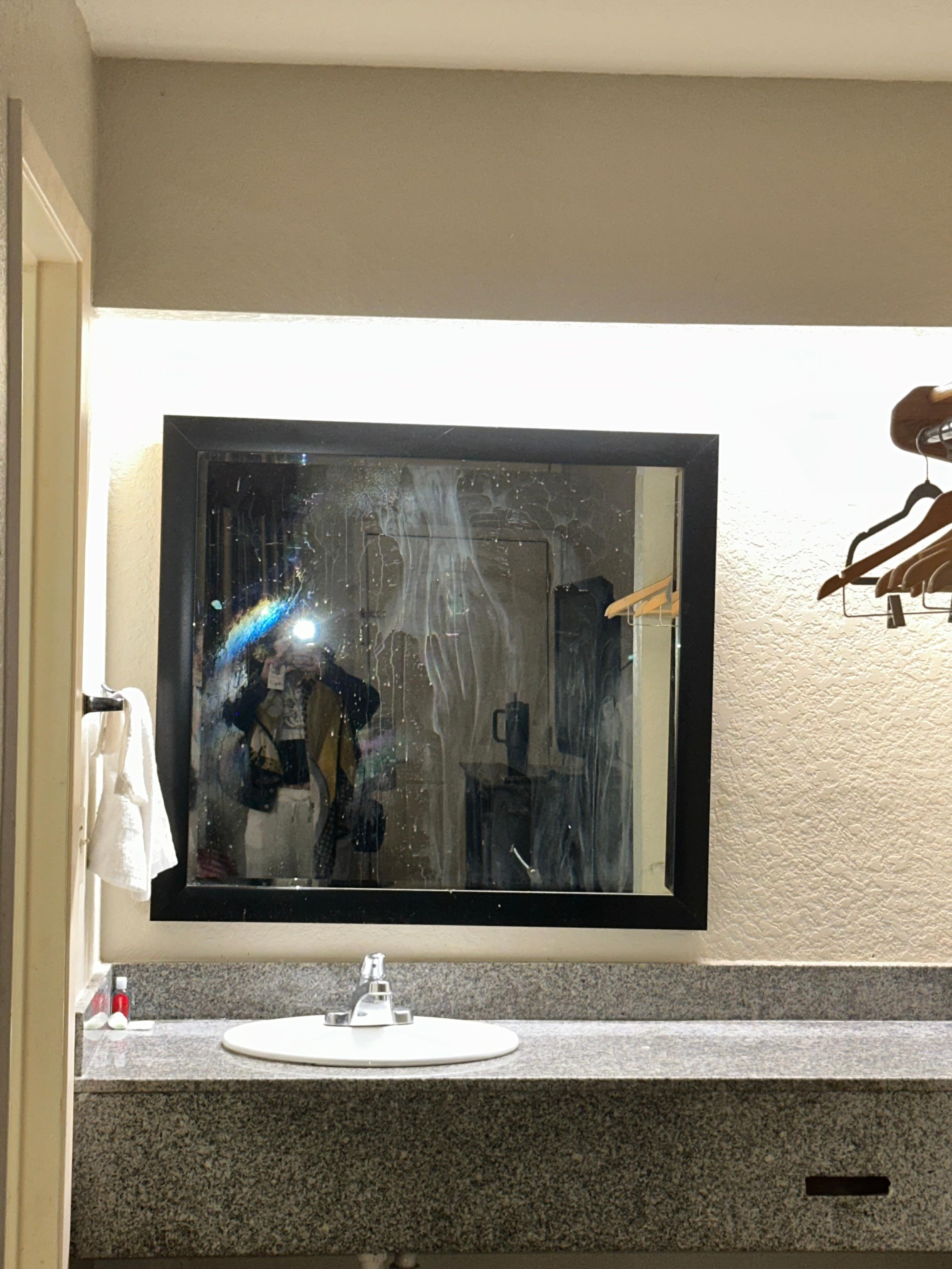 dirty sink and mirror