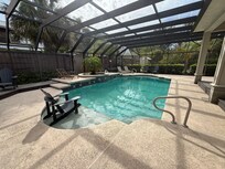Lovely pool and outdoor seating and eating area