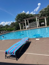 Pool area with waterfall hot tub